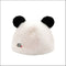 A plush hat with three-dimensional panda ears