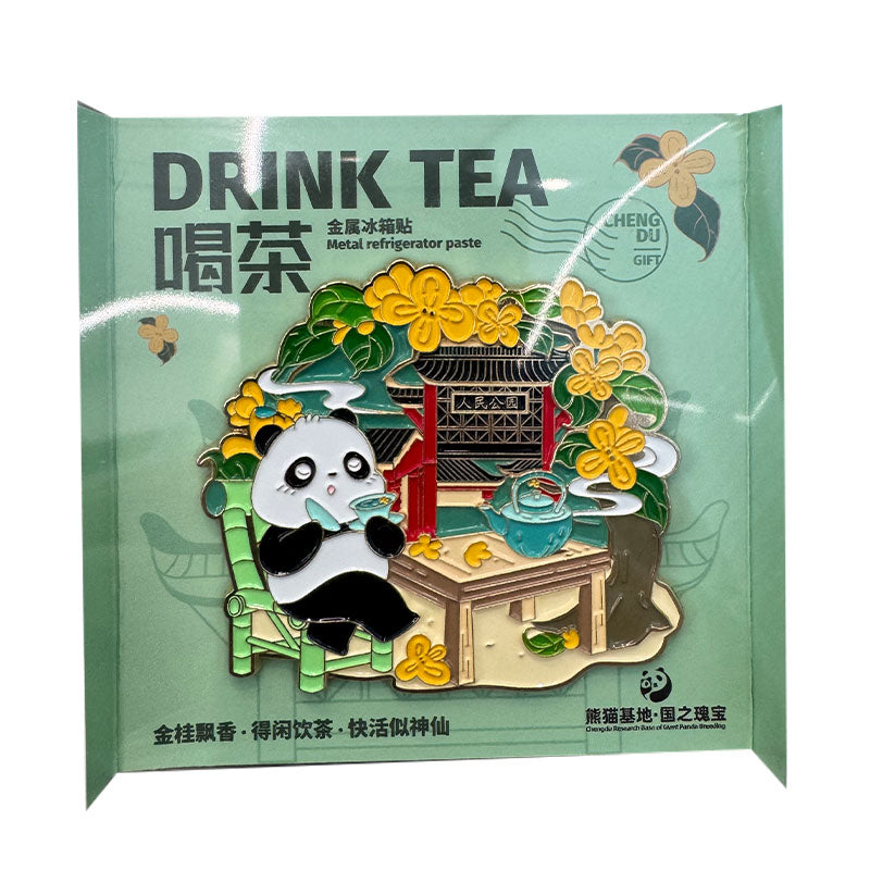 The official CCTV iPanda metal refrigerator magnet features a lazy panda drinking tea.